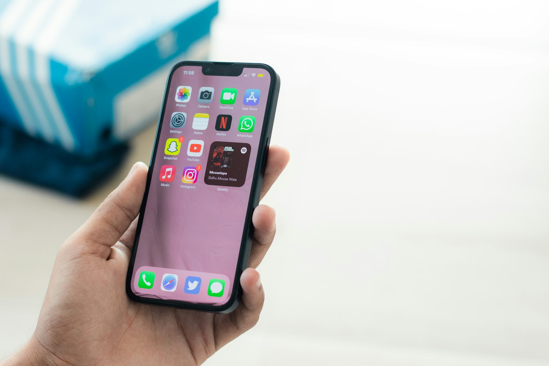 a person holding an iphone in their hand